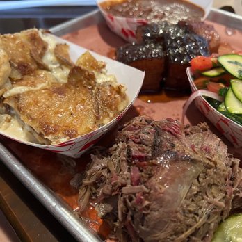 Interstellar BBQ - Scalloped potatoes (left) and lamb shoulder (bottom right) - Barbeque Near Me - Austin, Texas
