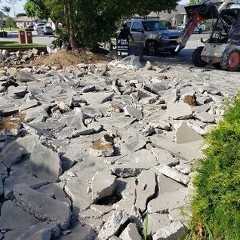 Vivid Landscape - Tree roots along edge of driveway had created hazards to cars and pedestrians alike, so driveway was replaced - Landscape Architects or Designers Near Me - Upland, California