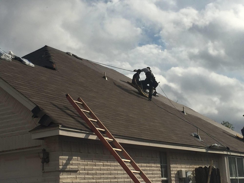 Slide of Roofmark Roofing and Construction