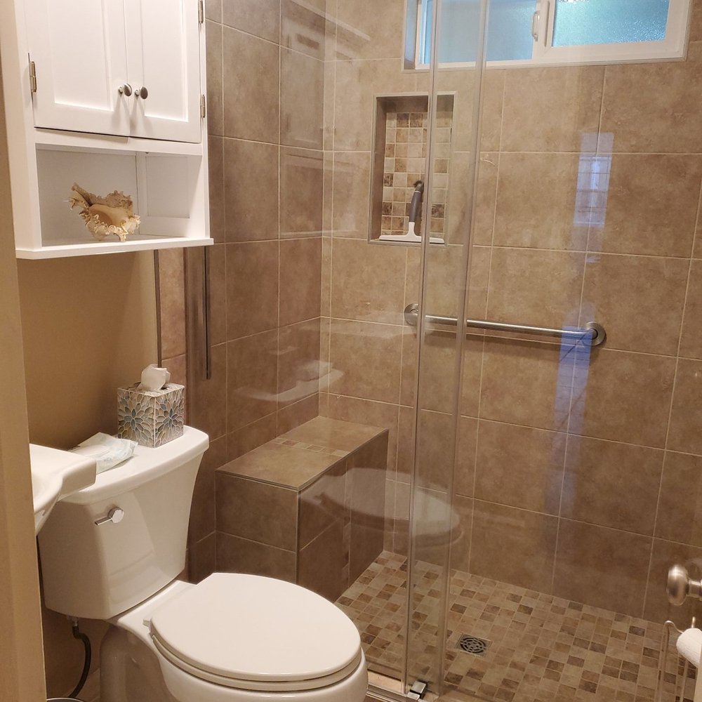 Alpine Construction - a bathroom with a toilet and shower - General Contractors Near Me - Napa, California Alpine Construction - a bathroom with a toilet and shower - General Contractors Near Me - Napa, California