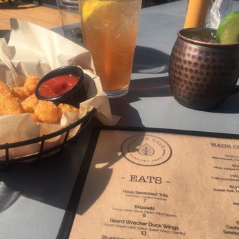 Poplar Haus - John Daly and a northwoods mule. And tots! - Sports Bars Near Me - Grand Marais, Minnesota Poplar Haus - John Daly and a northwoods mule. And tots! - Sports Bars Near Me - Grand Marais, Minnesota