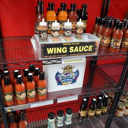 a display of wing sauces