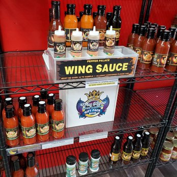 Pepper Palace - a display of wing sauces - Specialty Food Near Me - Monterey, California