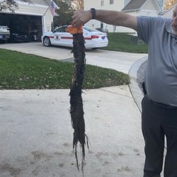 Giles Plumbing - root mass other company removed after Giles said drain was clear