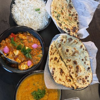Lazeez Modern Indian flair - lacha pyaz Dal and paneer mirch masala curries with garlic naan and khamiri (plain butter tandoori roti) roti - Indian Near Me - Richmond, Virginia Lazeez Modern Indian flair - lacha pyaz Dal and paneer mirch masala curries with garlic naan and khamiri (plain butter tandoori roti) roti - Indian Near Me - Richmond, Virginia