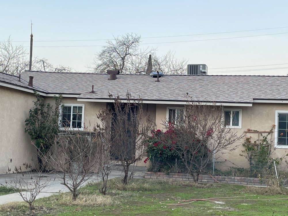 Slide of Magallon's Roofing