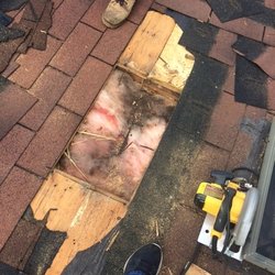 Bone Dry Roofing - Before: Roof was letting in moisture between 2 skylights.