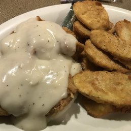 Fried chicken and gravy over mashed potatoes with fried squash. Delicious and well seasoned, but unfortunately the chicken was a little dry.
