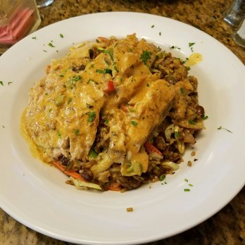 Mo's Restaurant - Grouper with rice and creole sauce.  Awesome - Haitian Near Me - Key West, Florida
