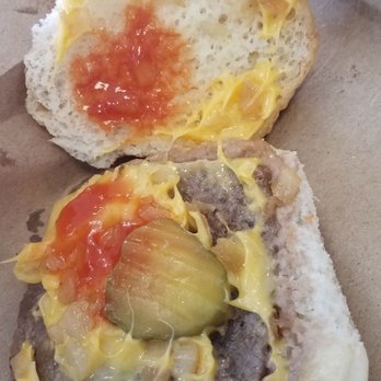 White Castle - a half eaten sandwich with a bite taken out of it - Burgers Near Me - Nanuet, New York White Castle - a half eaten sandwich with a bite taken out of it - Burgers Near Me - Nanuet, New York