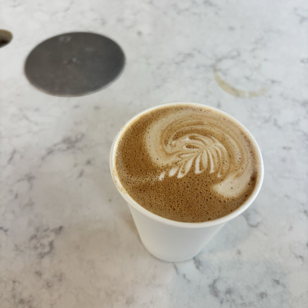 Three Keys Coffee Bar - A flat white with spiral art - Coffee & Tea Near Me - Houston, Texas Three Keys Coffee Bar - A flat white with spiral art - Coffee & Tea Near Me - Houston, Texas