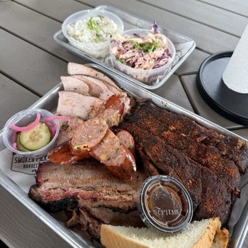 Smoked Pickle Barbecue - Turkey, brisket, smoked sausage, pork ribs, slaw, potato salad - Barbeque Near Me Smoked Pickle Barbecue - Turkey, brisket, smoked sausage, pork ribs, slaw, potato salad - Barbeque Near Me
