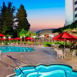 Sacramento Marriott Rancho Cordova - Relax outdoors on the patio or take a refreshing swim in our resort-style pool. Perfect for family fun and relaxation!