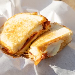 Chock Full of Cheese - Pepperoni: Pepperoni sandwich with homemade marinara sauce and both Munster and Mozzarella cheeses on sourdough bread.