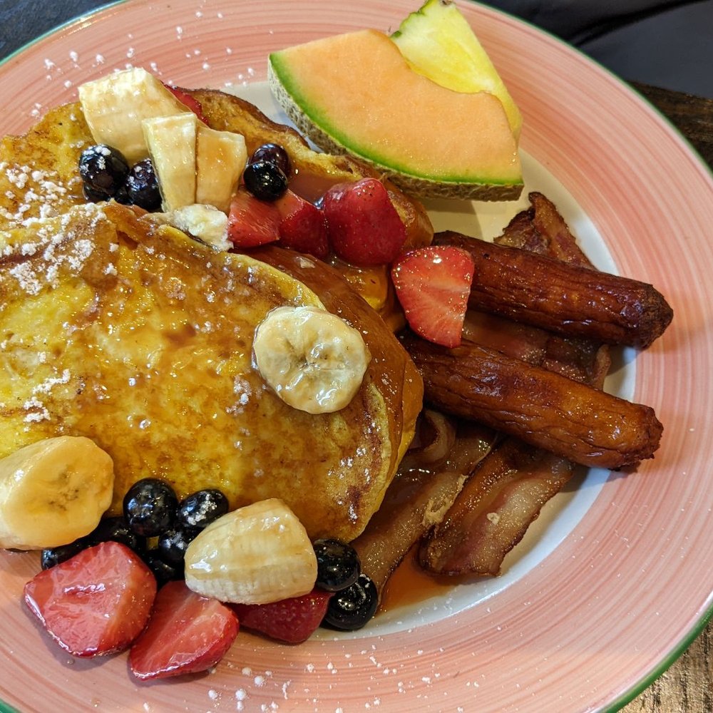 ViVetha Bistro - a plate of french toast and fruit - Canadian (New) Near Me - Toronto, Ontario ViVetha Bistro - a plate of french toast and fruit - Canadian (New) Near Me - Toronto, Ontario
