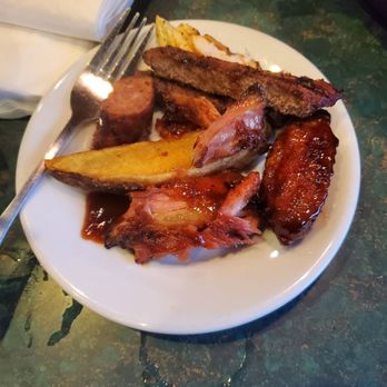 Smokey Bones  - My plate of the offerings from the bone fire sampler - Barbeque Near Me - Bowie, Maryland