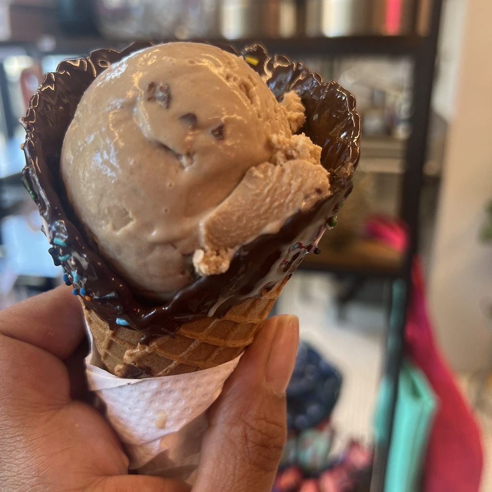 Brix Haus - a hand holding a cone of ice cream - Ice Cream & Frozen Yogurt Near Me - Brooklyn, New York