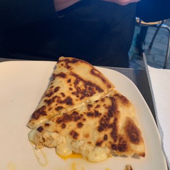 Willy Taco - Portion of chipotle pulled chicken quesadilla - Mexican Near Me - Spartanburg, South Carolina