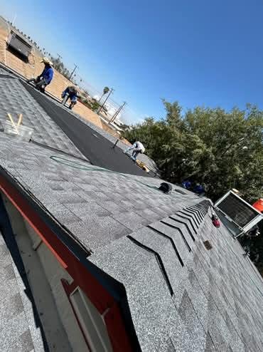 Slide of Raymond The Roofer