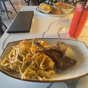 Hyde & Seek - My husband got the crawfish etouffee delight and I got the lamb chop past deluxe.  The food was so rich, well seasoned, and delicious. - Dance Clubs Near Me - Dallas, Texas