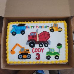 Cake's Amore - The dirt in the dump truck and in the bucket of the green truck was great! Cutest cake ever!!