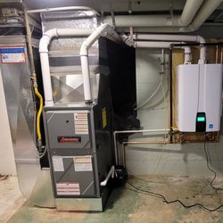 Mountain Air Mechanical Contractors - Clean upgrade with the tankless water heater and 96% AFUE Amana furnace.