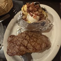 Cy's Hoof & Horn Supper Club - KC strip and baked potato