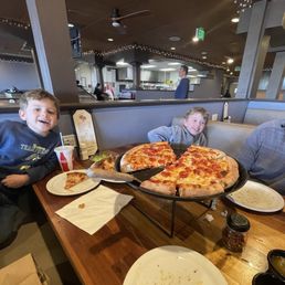 Pepperoni pizza and happy kids Pepperoni pizza and happy kids