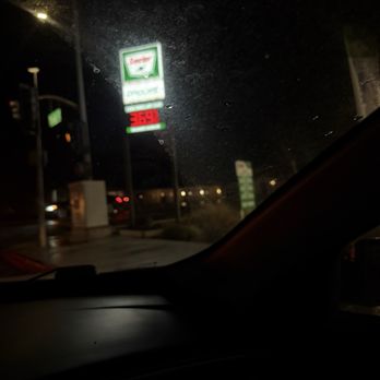 Robin's Mini Mart - Taken from across the street. It's a very clean and beautifully manicured exterior. - Grocery Near Me - Hanford, California
