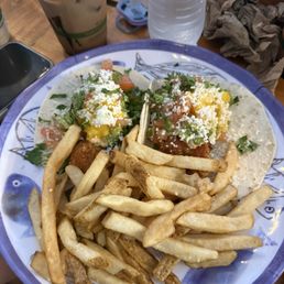 Shrimp tacos and fries Shrimp tacos and fries