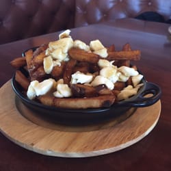 La Cage Aux Sports - Small portion for a 7$ poutine...petite portion pour une poutine a 7$
