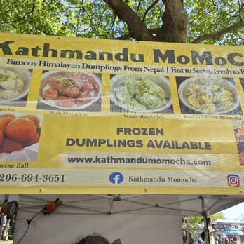 Kathmandu Momocha - Sign at Folklife Festival. They cater, too. - Himalayan/Nepalese Near Me - Seattle, Washington Kathmandu Momocha - Sign at Folklife Festival. They cater, too. - Himalayan/Nepalese Near Me - Seattle, Washington