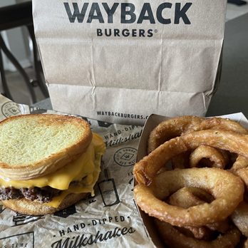 Wayback Burger - The Cheesy and a side of onion rings - Burgers Near Me - Universal City, Texas Wayback Burger - The Cheesy and a side of onion rings - Burgers Near Me - Universal City, Texas
