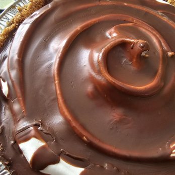 Thoughtful Baking - a chocolate pie with whipped cream and chocolate icing - Bakeries Near Me - Charlotte, North Carolina Thoughtful Baking - a chocolate pie with whipped cream and chocolate icing - Bakeries Near Me - Charlotte, North Carolina
