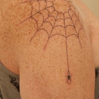 Imperfect Artistry - Spider web tattoo with tiny spider on right shoulder - Eyelash Service Near Me - Scottsdale, Arizona