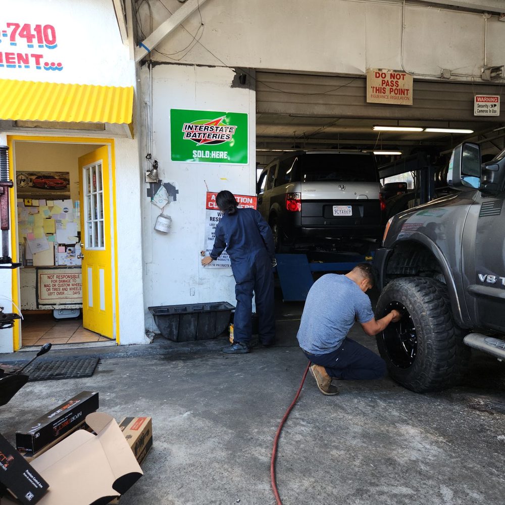 Cesar’s tires - Worker putting up sign that they are not responsible for damage to wheels After they had damaged my wheels. - Tires Near Me - Daly City, California Cesar’s tires - Worker putting up sign that they are not responsible for damage to wheels After they had damaged my wheels. - Tires Near Me - Daly City, California