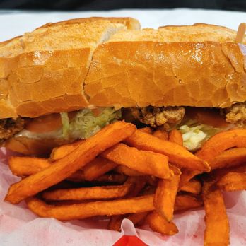 Crawfish House - Oyster po boy sandwich with yam fries, $13.99 - 3.5 Stars - Seafood Near Me - Renton, Washington