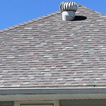 Top Tier Construction - the roof of a house - Roofing Near Me