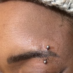Avenging Art Tattoo - Eyebrow piercing