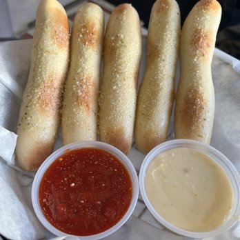 Silver Beach Pizza - Breadsticks with cheese and marinara - Pizza Near Me - Saint Joseph, Michigan Silver Beach Pizza - Breadsticks with cheese and marinara - Pizza Near Me - Saint Joseph, Michigan