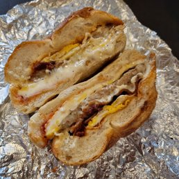 Sausage bacon egg and cheese on a roll - yummm Sausage bacon egg and cheese on a roll - yummm