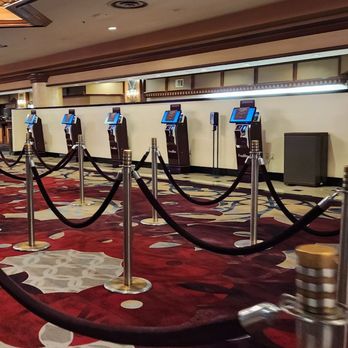 Excalibur Hotel - Kiosks to check yourself in. No human interaction anymore (except the 3 ladies pointing for you to go to the kiosks). - Hotels Near Me - Las Vegas, Nevada Excalibur Hotel - Kiosks to check yourself in. No human interaction anymore (except the 3 ladies pointing for you to go to the kiosks). - Hotels Near Me - Las Vegas, Nevada