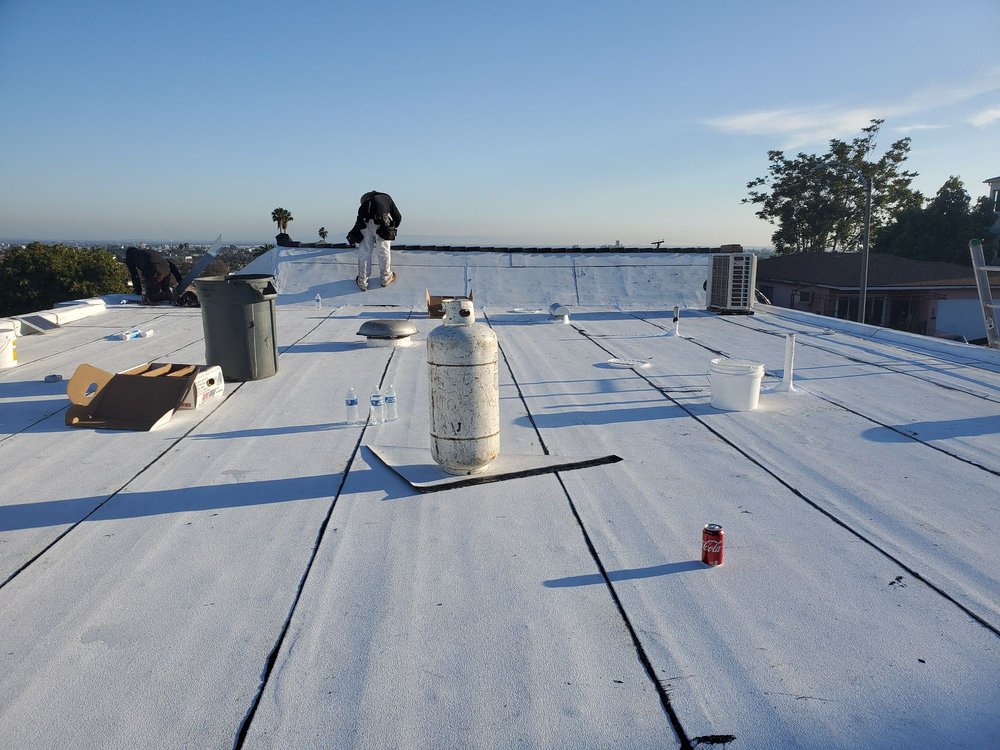 Slide of Trujano Roofing