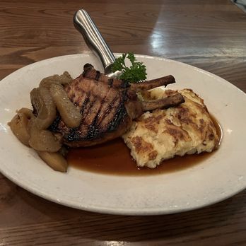Chester's Kitchen and Bar - Double Cut Duroc Pork Chop (fire roasted apples and smoked Gouda hash browns). - New American Near Me - Rochester, Minnesota Chester's Kitchen and Bar - Double Cut Duroc Pork Chop (fire roasted apples and smoked Gouda hash browns). - New American Near Me - Rochester, Minnesota