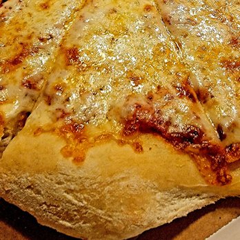 Dugan's Pizza - a pizza with cheese on it - Pizza Near Me - Ocean Shores, Washington Dugan's Pizza - a pizza with cheese on it - Pizza Near Me - Ocean Shores, Washington