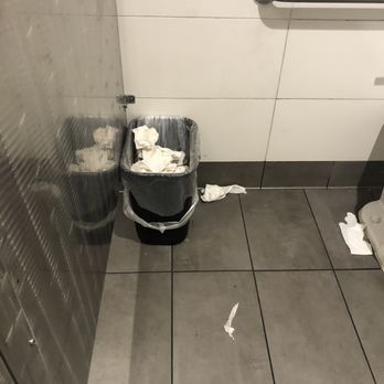 McDonald's - Garbage and floor near toilet in mens room - Fast Food Near Me - Ontario, California