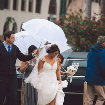 TJ Limousine Service - Picture of TJ holding the bride's umbrella! - Limos Near Me TJ Limousine Service - Picture of TJ holding the bride's umbrella! - Limos Near Me