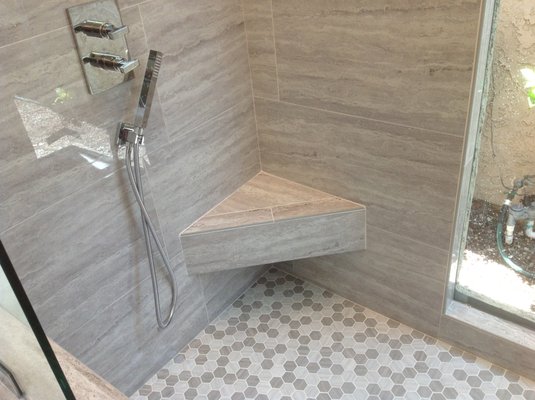 Bathroom Remodel - This remodel was done in the city of Mission Viejo. We added a pony wall to separate the shower and the toilet area. New tile, drain, shower valve and glass was added to this remodel.