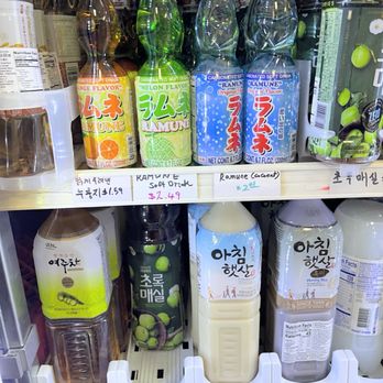 MODU MART - the white milky drink is a rice drink that is sweet and refreshing & the green plum drink is also delicious and refreshing!! - International Grocery Near Me - Ann Arbor, Michigan
