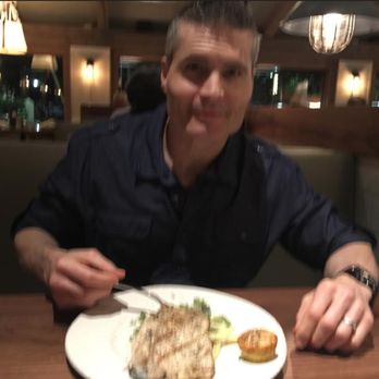 Bluewater Grill Seafood Restaurant & Market Carlsbad - My hunky date and a plate of fish. I'll take THAT GUY on a plate...yum... (I thought it was the tequila but my camera was out of focus!) - Seafood Near Me - Carlsbad, California